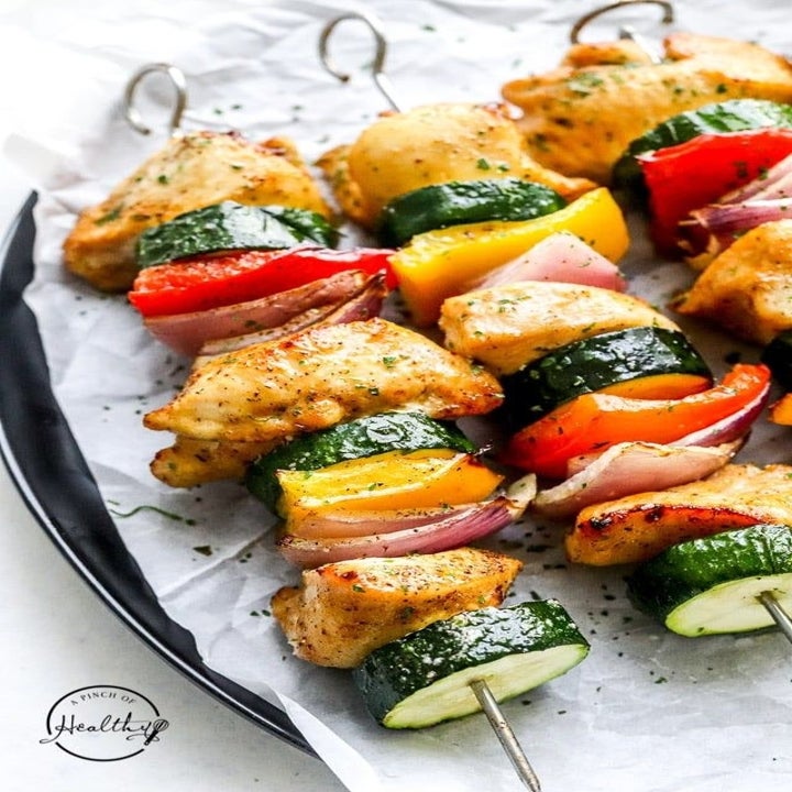 Chicken skewers with zucchini and onion.